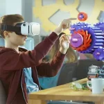 a child wearing a VR headset whilst working on a puzzle involving cogs